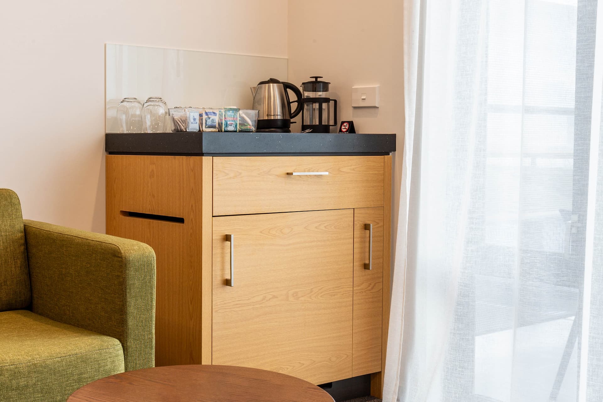 Custom minibar cabinet at Cancer Care accommodation