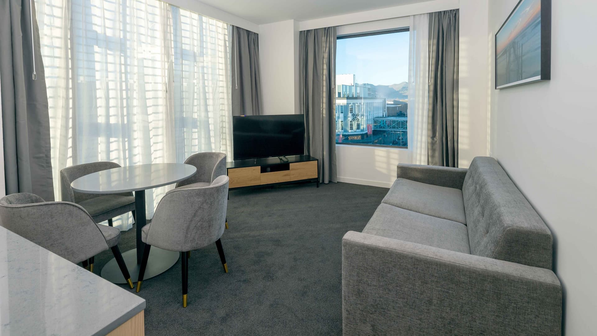 Guest room lounge and dining furniture at Christchurch City Hotel