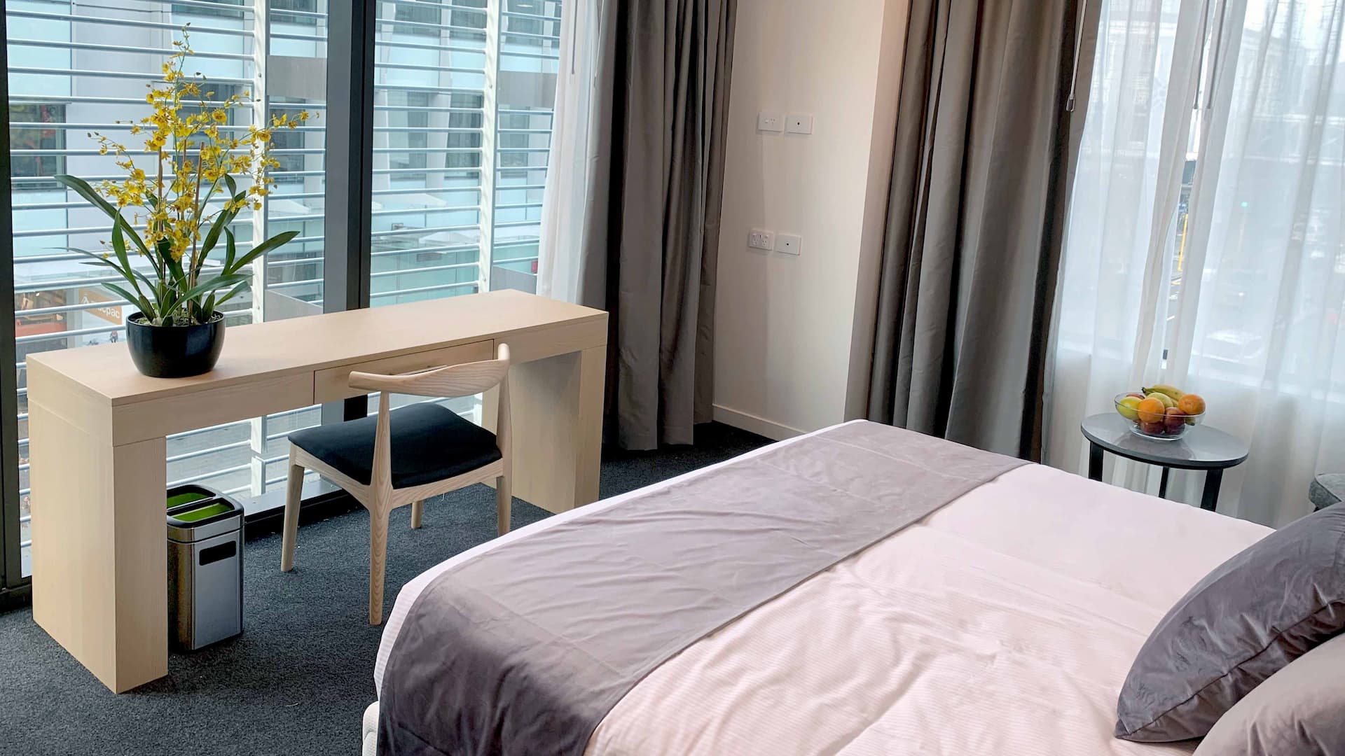 Guest room desk and city view at Christchurch City Hotel