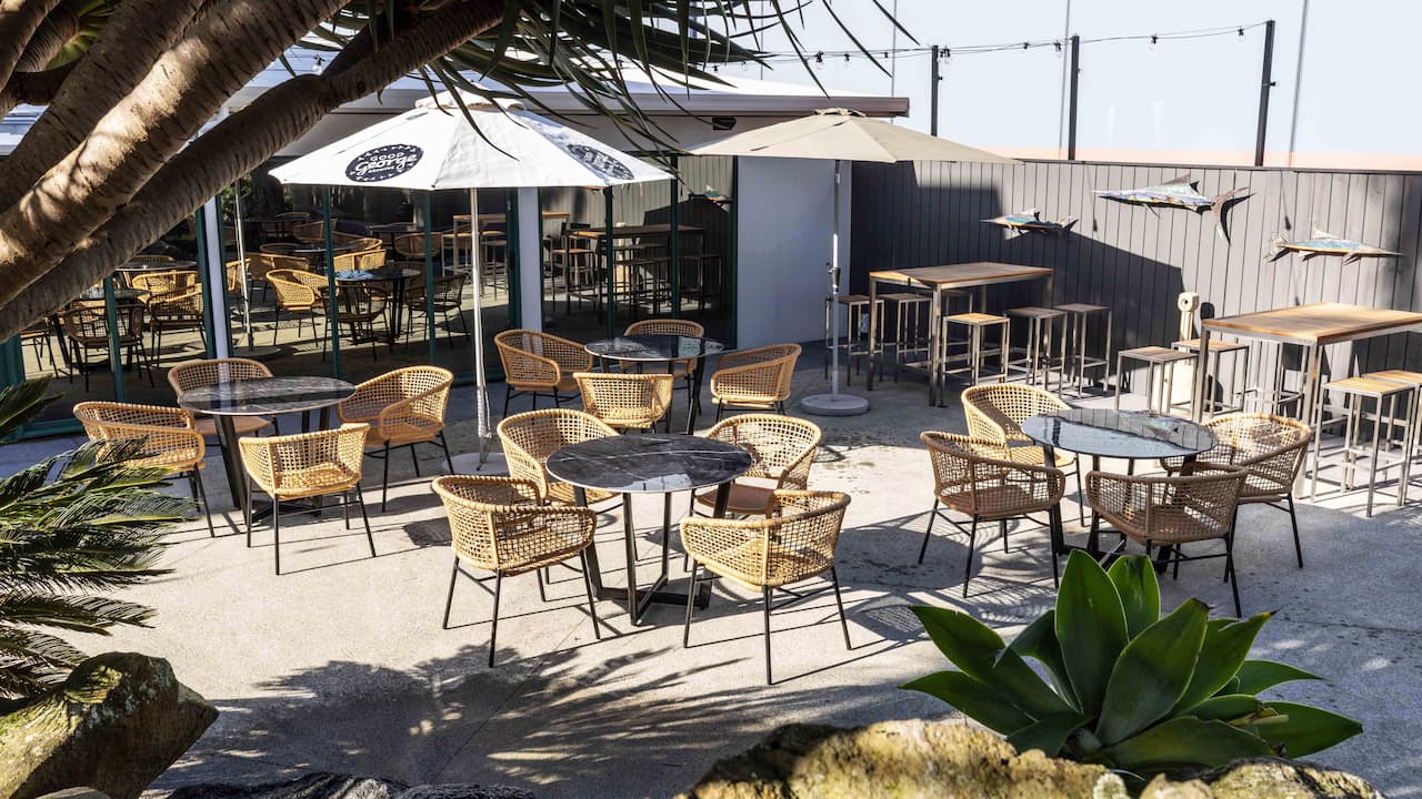 LAT Bar outdoor dining courtyard at Jet Park Hotel Auckland